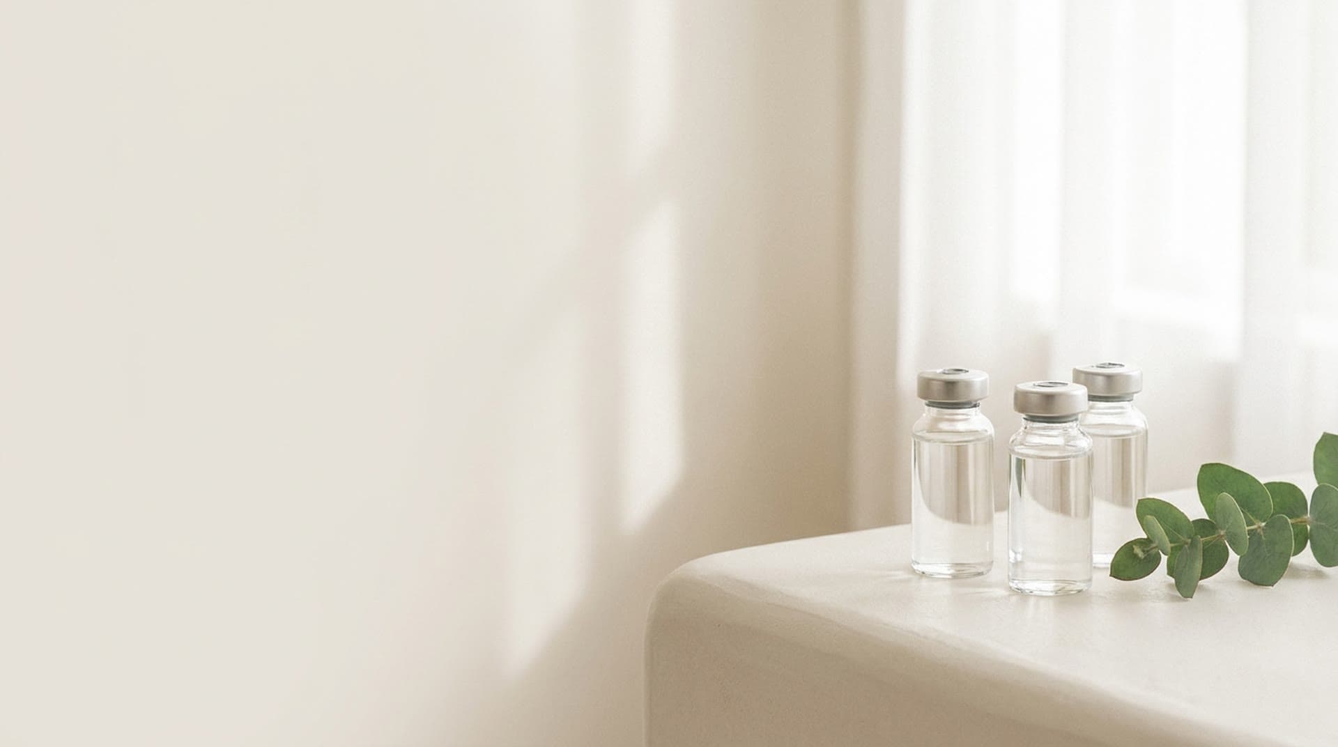Sealed glass vials in soft natural daylight